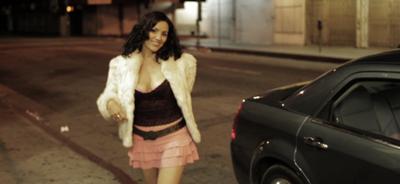 Star (Romina Peniche) getting dropped off in the streets.